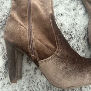 Thigh high boots. Worn approx. 5 times. Material unknown; believe suede.